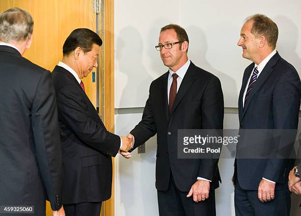 Chinese President Xi Jinping shakes hands with Andrew Little Leader of the Opposition while David Shearer waits for his chance, before starting talks...