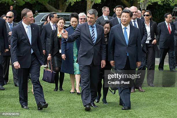 New Zealand Prime Minister John Key and Minister for Primary Industries Nathan Guy welcome President Xi Jinping of China to the Karaka Agitech event...