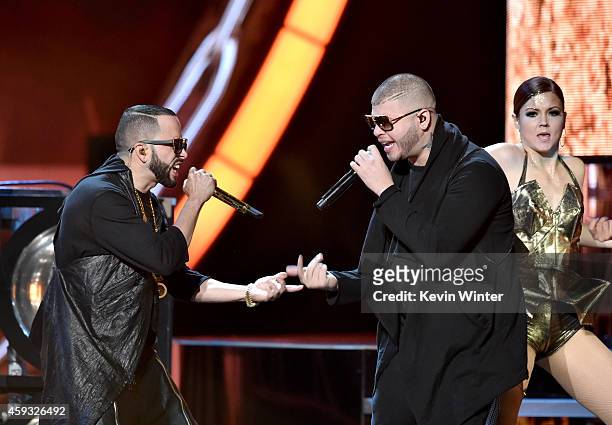 Recording artists Yandel and Farruko perform onstage during the 15th annual Latin GRAMMY Awards at the MGM Grand Garden Arena on November 20, 2014 in...