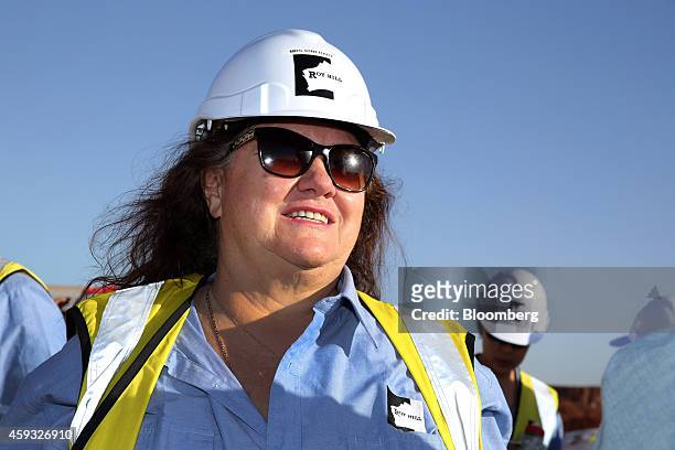 Billionaire Gina Rinehart, chairman of Hancock Prospecting Pty, stands for a photograph during a tour of the company's Roy Hill Mine operations under...