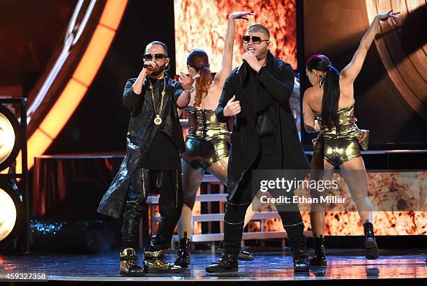Recording artists Yandel and Farruko perform onstage during the 15th Annual Latin GRAMMY Awards at the MGM Grand Garden Arena on November 20, 2014 in...