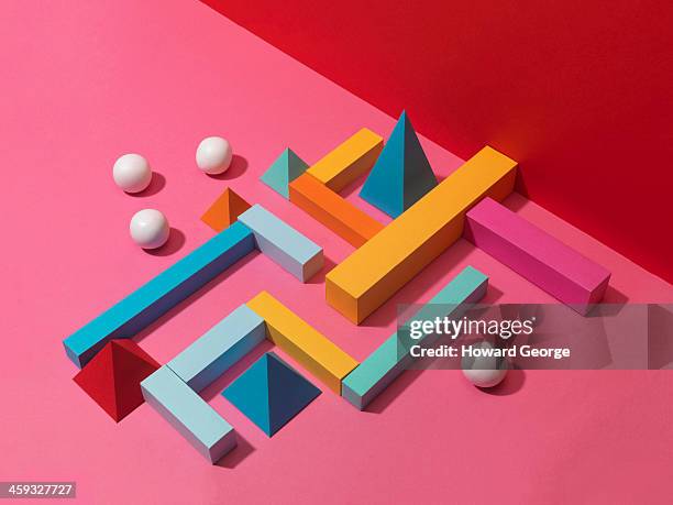 white balls with colour shape maze - geometric maze stock pictures, royalty-free photos & images