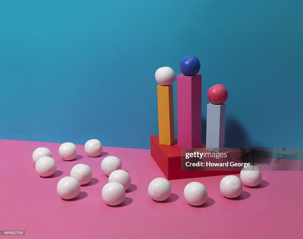 White and Coloured Balls on Coloured Plinths