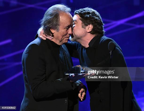 Person of the Year honoree Joan Manuel Serrat and recording artist Joaquin Sabina speak onstage during the 15th annual Latin GRAMMY Awards at the MGM...