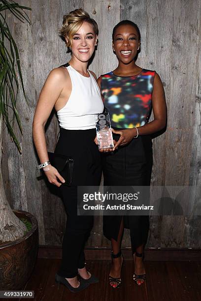 Writer Lauren Morelli and actress Samira Wiley attend Out100 2014 presented by Buick on November 20, 2014 in New York City.