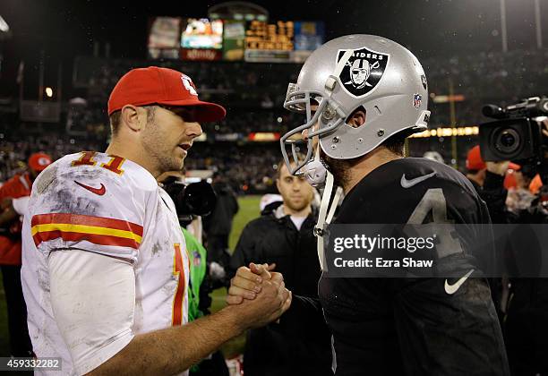 Derek Carr of the Oakland Raiders shakes hands with Alex Smith of the Kansas City Chiefs after the Raiders beat the Chiefs for their first win of the...