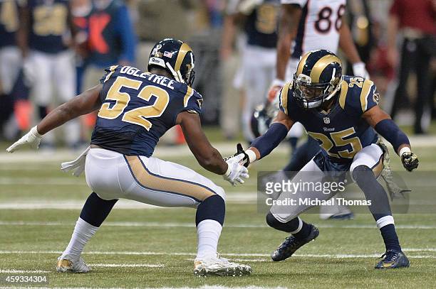 McDonald and Alec Ogletree both of the St. Louis Rams celebrate after an interception against the Denver Broncos at the Edward Jones Dome on November...