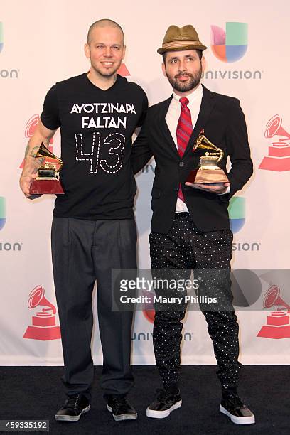 Recording artists Residente Calle 13 and Visitante of music group Calle 13, winners of Best Alternative Song, pose in the press room during the 15th...
