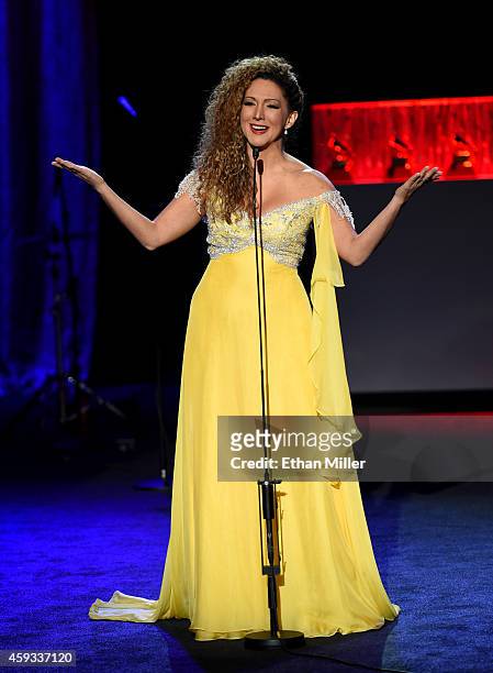Erika Ender speaks onstage during the 15th annual Latin GRAMMY Awards premiere ceremony at the Hollywood Theatre at the MGM Grand Hotel/Casino on...