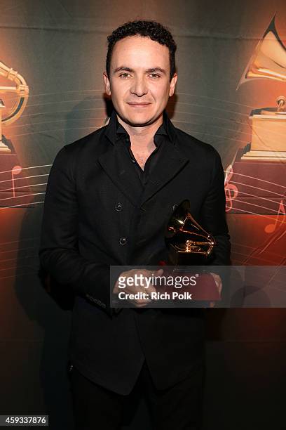Singer Fonseca accepts the award for Best Traditional Pop Vocal Album during the 15th annual Latin GRAMMY Awards premiere ceremony at the Hollywood...