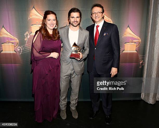 Chair of the Board of Trustee sof the Latin Recording Academy, Laura Tesoriero; Recording artist Juanes, winner of the Best Pop/Rock Album award for...