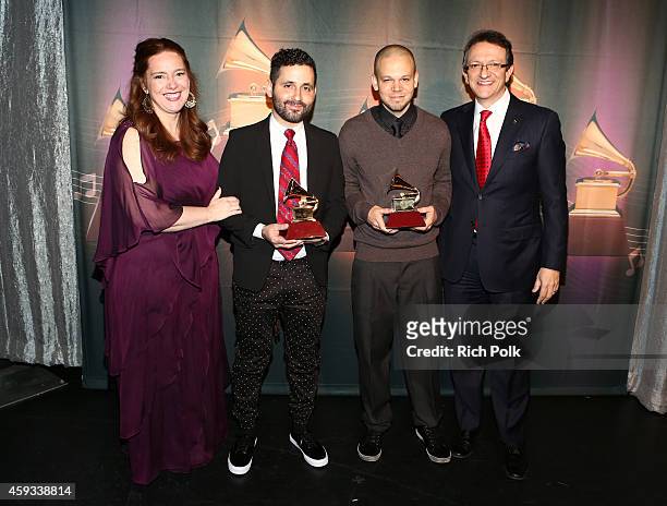 Chair of the Board of Trustees of the Latin Recording Academy, Laura Tesoriero; musicians Visitante and Rene Perez Joglar Calle 13, winner of the...