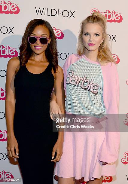Wildfox Resort campaign models Merethe Hopland and Kirby Griffin attend the Barbie Loves Wildfox party celebrating the Resort 2014 collaboration...