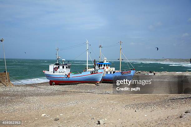fishermans boats on beach at nørre vorupør - jutland stockfoto's en -beelden
