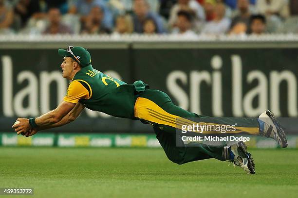 Ryan McLaren of South Africa catches out Matthew Wade of Australia during game four of the One Day International series between Australia and South...