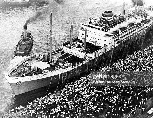 People see off the Brazil Maru, which carries Japanese immigrants to Brazil, departs at Kobe Port on July 30, 1954 in Kobe, Hyogo, Japan.
