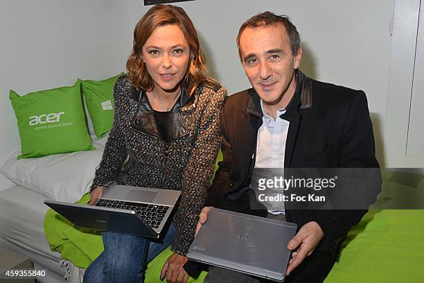 Sandrine Quetier and Elie Semoun attend the Acer Pop Up Store Launch Party at Les Halles on November 20, 2014 in Paris, France.