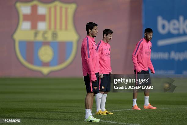 Barcelona's Uruguayan forward Luis Suarez , Barcelona's Argentinian forward Lionel Messi and Barcelona's Brazilian forward Neymar da Silva Santos...