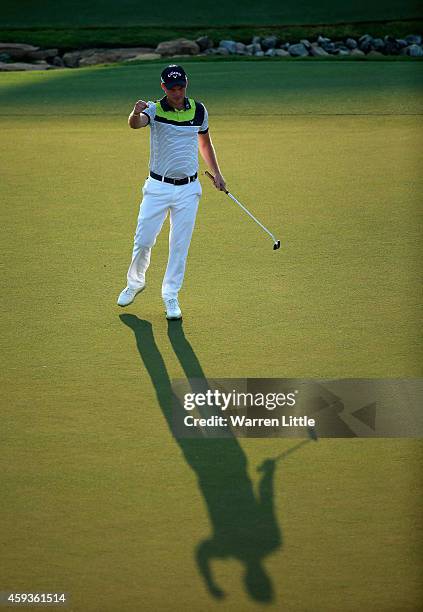 Danny Willett of England celebrates a eagle on the 18th green during the second round of the DP World Tour Championship at Jumeirah Golf Estates on...