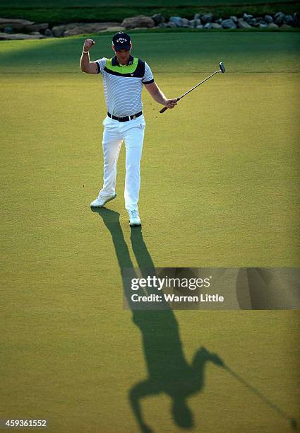 Danny Willett of England celebrates a eagle on the 18th green during the second round of the DP World Tour Championship at Jumeirah Golf Estates on...