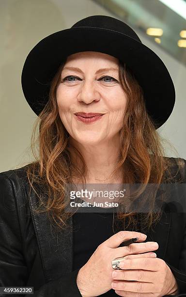 Fashion designer Ann Demeulemeester attends "Ann Demeulemeester Photobook" autographing event at Dover Street Market Ginza on November 21, 2014 in...