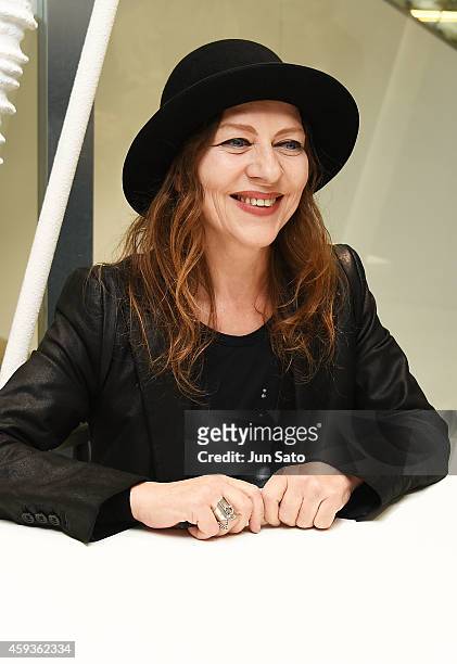Fashion designer Ann Demeulemeester attends "Ann Demeulemeester Photobook" autographing event at Dover Street Market Ginza on November 21, 2014 in...