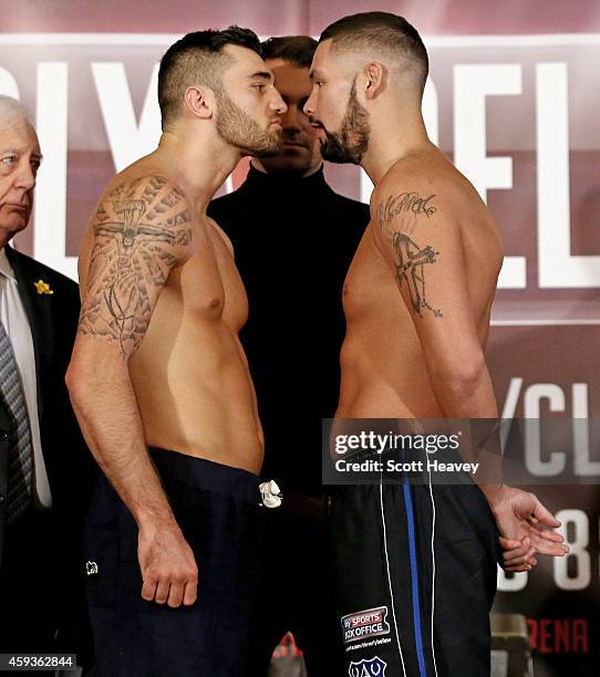 Nathan Cleverly and Tony Bellew come face to face during the weigh in at on November 21, 2014 in Liverpool, England.