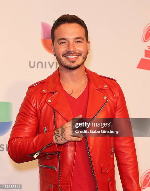 Singer J Balvin poses in the press room during the 15th annual Latin GRAMMY Awards at the MGM Grand Garden Arena on November 20, 2014 in Las Vegas,...
