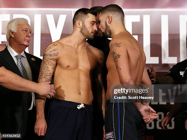 Nathan Cleverly and Tony Bellew come face to face during the weigh in at on November 21, 2014 in Liverpool, England.