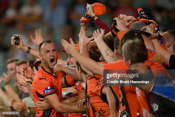 Ivan Franjic of the Roar celebrates with fans after scoring during the round 12 A-League match between Sydney FC and Brisbane Roar at Allianz Stadium...