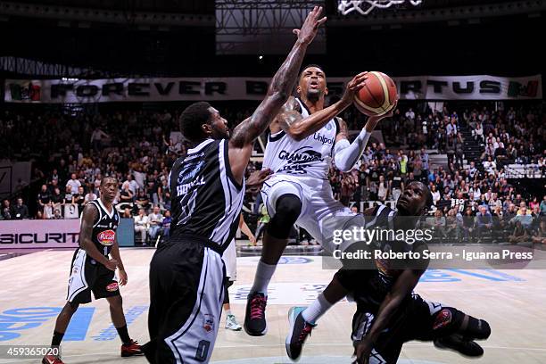 Allan Ray of Virtus of Granarolo competes with Ronald Moore and Richard Howell of Pasta Reggia during the LegaBasket Serie A1 basketball match...