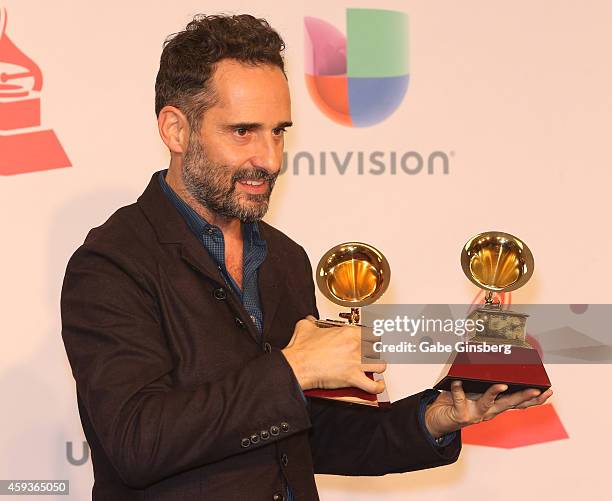 Musician Jorge Drexler, winner of Best Singer-Songwriter Album, poses in the press room during the 15th annual Latin GRAMMY Awards at the MGM Grand...