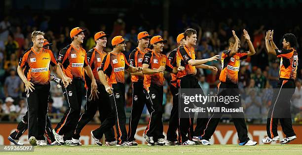 The Perth Scorchers celebrate after winning the Big Bash League match between the Perth Scorchers and the Melbourne Renegades at WACA on December 26,...