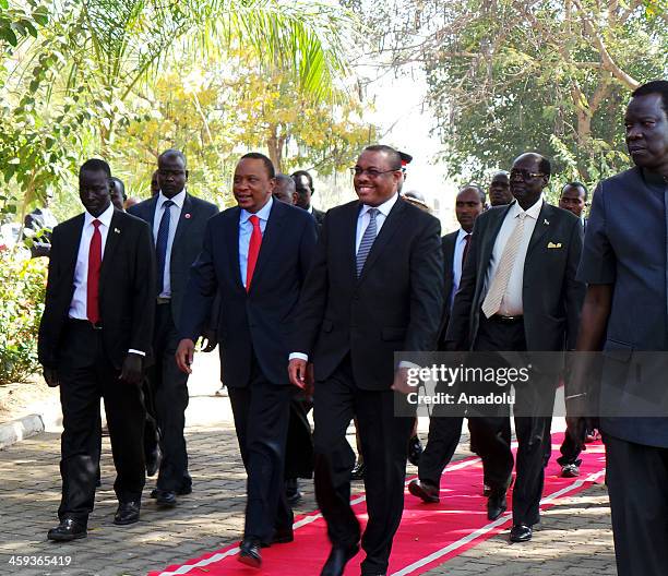 Ethiopian Prime Minister Hailemariam Desalegn and Kenyan President Uhuru Kenyatta arrive for a meeting with South Sudan President Salva Kiir Mayardit...