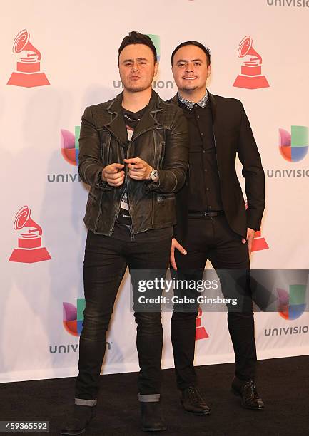 Musicians Jose Luis Ortega and Raul Ortega of Rio Roma pose iin the press room during the 15th annual Latin GRAMMY Awards at the MGM Grand Garden...