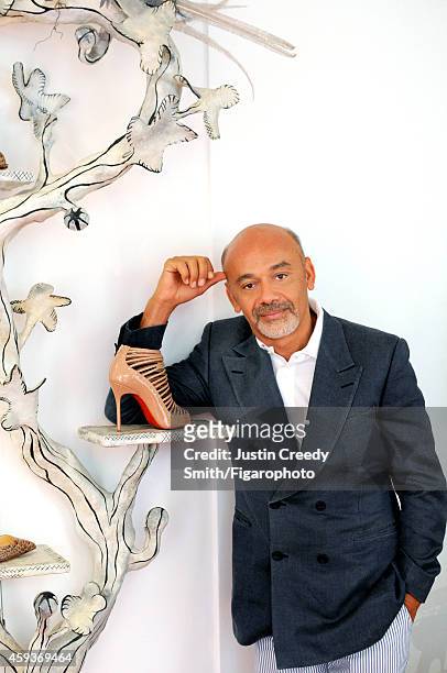 Designer Christian Louboutin is photographed for Madame Figaro on September 10, 2014 in Paris, France. PUBLISHED IMAGE. CREDIT MUST READ: Justin...