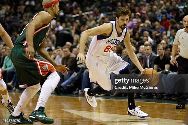 Alexy Shved of the Philadelphia 76ers dribbles the basketball during the game against the Milwaukee Bucks at BMO Harris Bradley Center on October 31,...