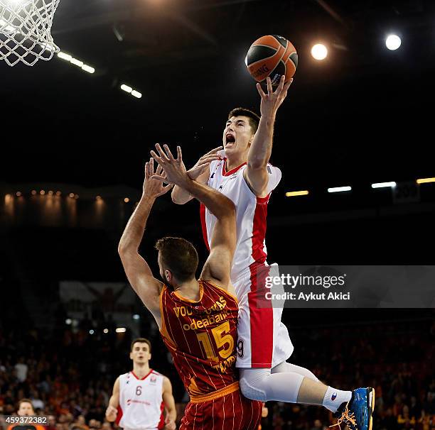 Luka Mitrovic, #9 of Crvena Zvezda Telekom Belgrade competes with Ian Vougiouskas, #15 of Galatasaray Liv Hospital Istanbul in action during the...