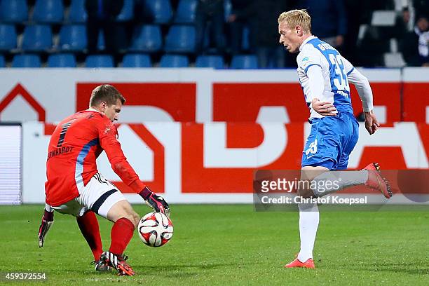 Daniel Bernhardt of Aalen saves the ball against Mikael Forssell of Bochum during the Second Bundesliga match between VfL Bochum and VfR Aalen at...