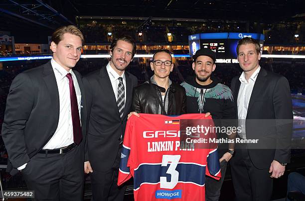 Laurin Braun, Mark Bell, Chester Bennington, Mike Shinoda of Linkin Park and Andre Rankel of the Eisbaeren Berlin during the game between Eisbaeren...