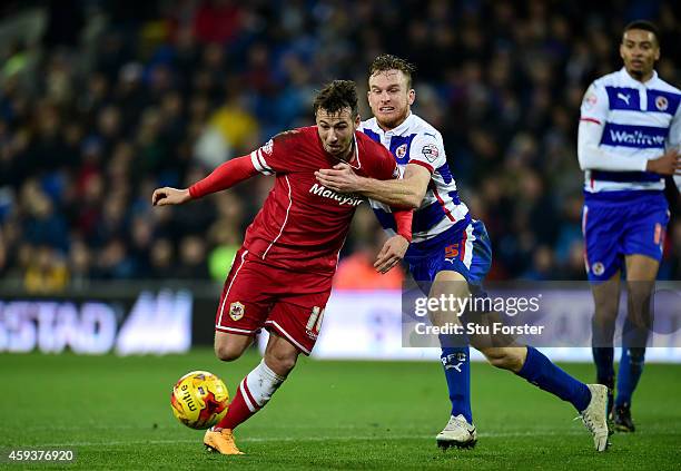 Cardiff player Adam Le Fondre is fouled by Reading player Alex Pearce who is then red carded during the Sky Bet Championship match between Cardiff...