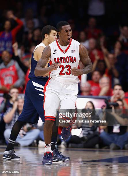 Rondae Hollis-Jefferson of the Arizona Wildcats celebrates after a slam dunk against the UC Irvine Anteaters during the second half of the college...