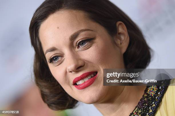 Actress Marion Cotillard arrives at the AFI FEST 2014 Presented By Audi - 'Two Days, One Night' special screening at the Egyptian Theatre on November...