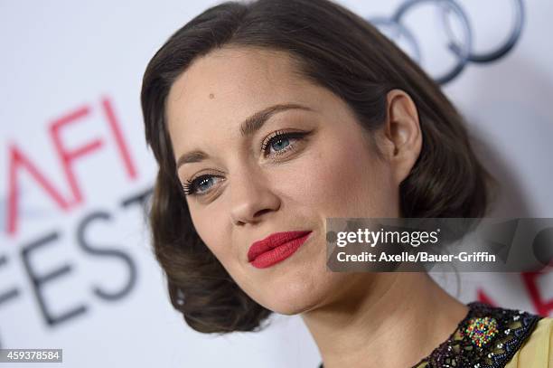 Actress Marion Cotillard arrives at the AFI FEST 2014 Presented By Audi - 'Two Days, One Night' special screening at the Egyptian Theatre on November...