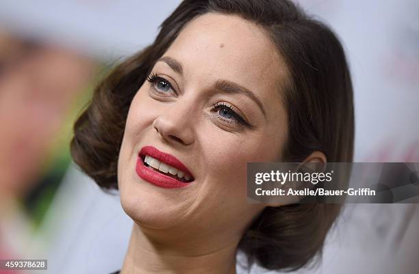 Actress Marion Cotillard arrives at the AFI FEST 2014 Presented By Audi - 'Two Days, One Night' special screening at the Egyptian Theatre on November...