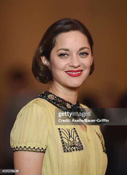 Actress Marion Cotillard arrives at the AFI FEST 2014 Presented By Audi - 'Two Days, One Night' special screening at the Egyptian Theatre on November...