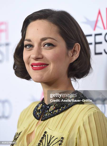 Actress Marion Cotillard arrives at the AFI FEST 2014 Presented By Audi - 'Two Days, One Night' special screening at the Egyptian Theatre on November...