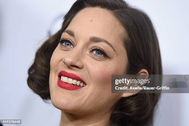 Actress Marion Cotillard arrives at the AFI FEST 2014 Presented By Audi - 'Two Days, One Night' special screening at the Egyptian Theatre on November...
