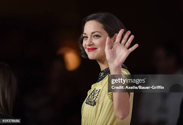 Actress Marion Cotillard arrives at the AFI FEST 2014 Presented By Audi - 'Two Days, One Night' special screening at the Egyptian Theatre on November...