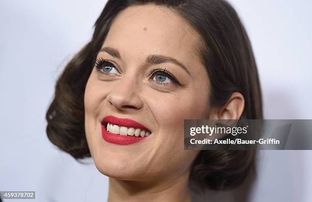 Actress Marion Cotillard arrives at the AFI FEST 2014 Presented By Audi - 'Two Days, One Night' special screening at the Egyptian Theatre on November...